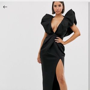 Black. Formal dress, shoulder detail and thigh split